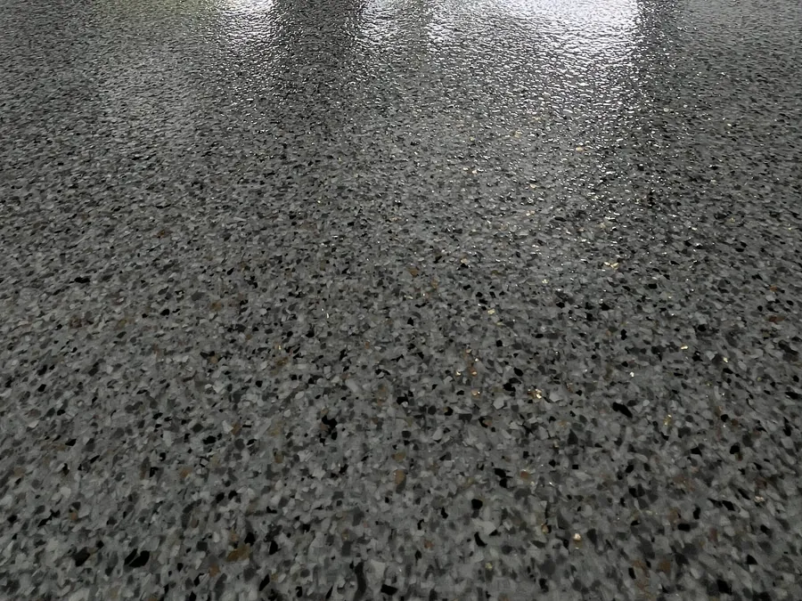 Gray flake garage floor under a fresh high gloss topcoat
