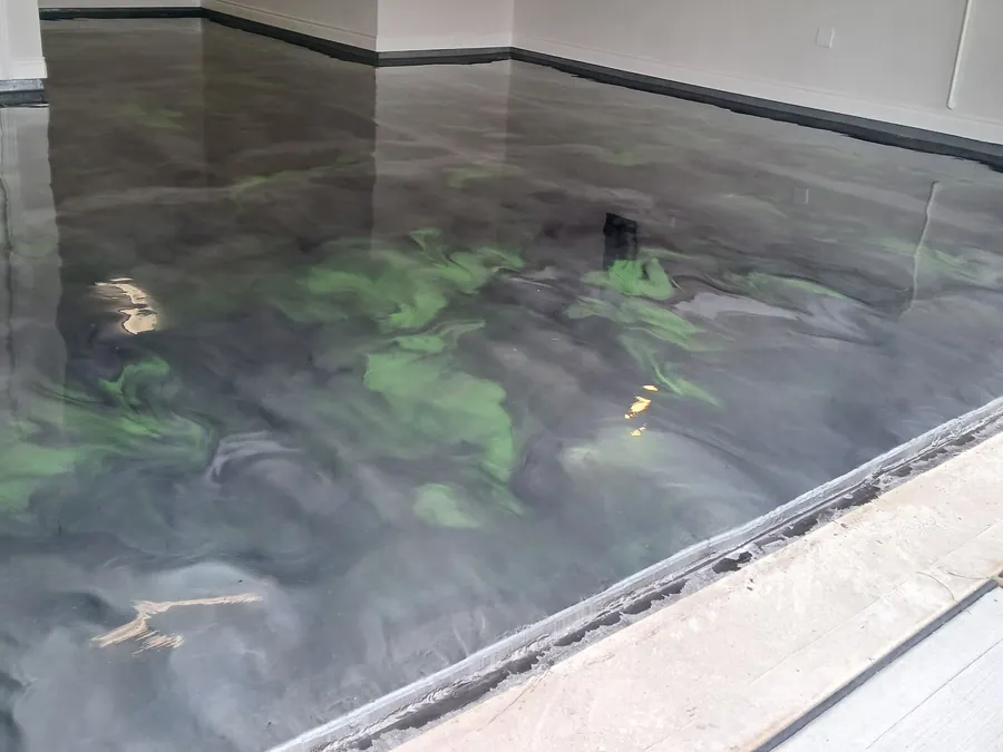 Gray and green metallic epoxy garage floor