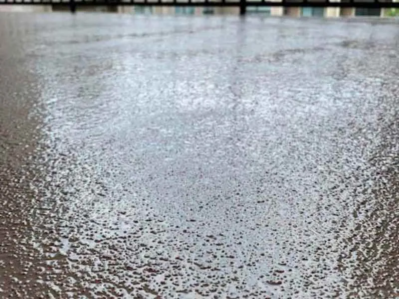 Textured anti-slip coating on an apartment balcony walkway