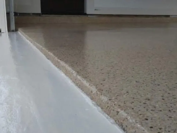 Flake coating on a porch step and landing