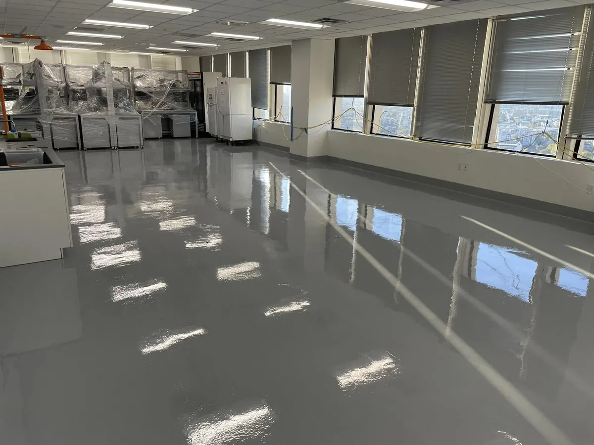 Coated lab floor reflecting the ceiling lights