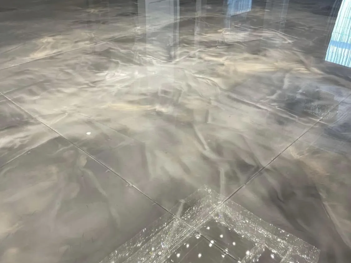 Silver metallic epoxy floor in a home interior